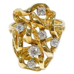 Anello in oro giallo con più diamanti