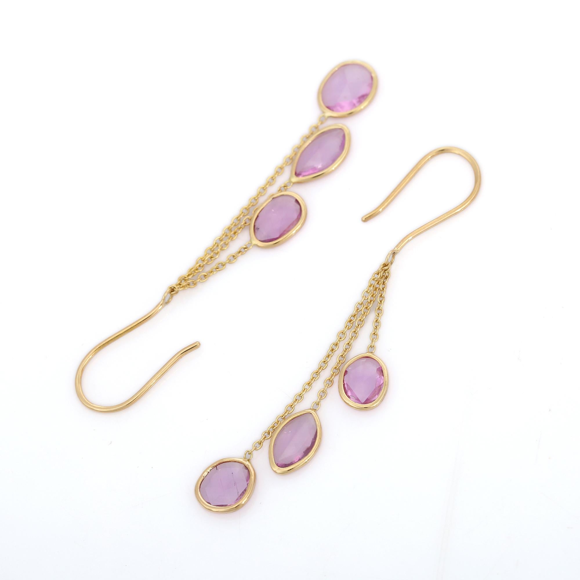 18K Yellow Gold Pink Sapphire Multi Layered Dangle earrings to make a statement with your look. These earrings create a sparkling, luxurious look featuring uneven cut gemstone.
If you love to gravitate towards unique styles, this piece of jewelry is