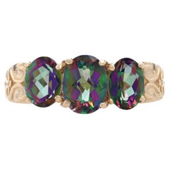 Gelbgold Mystic Topas Drei-Stein-Ring, 14k Oval Kartonschliff 3,80ctw