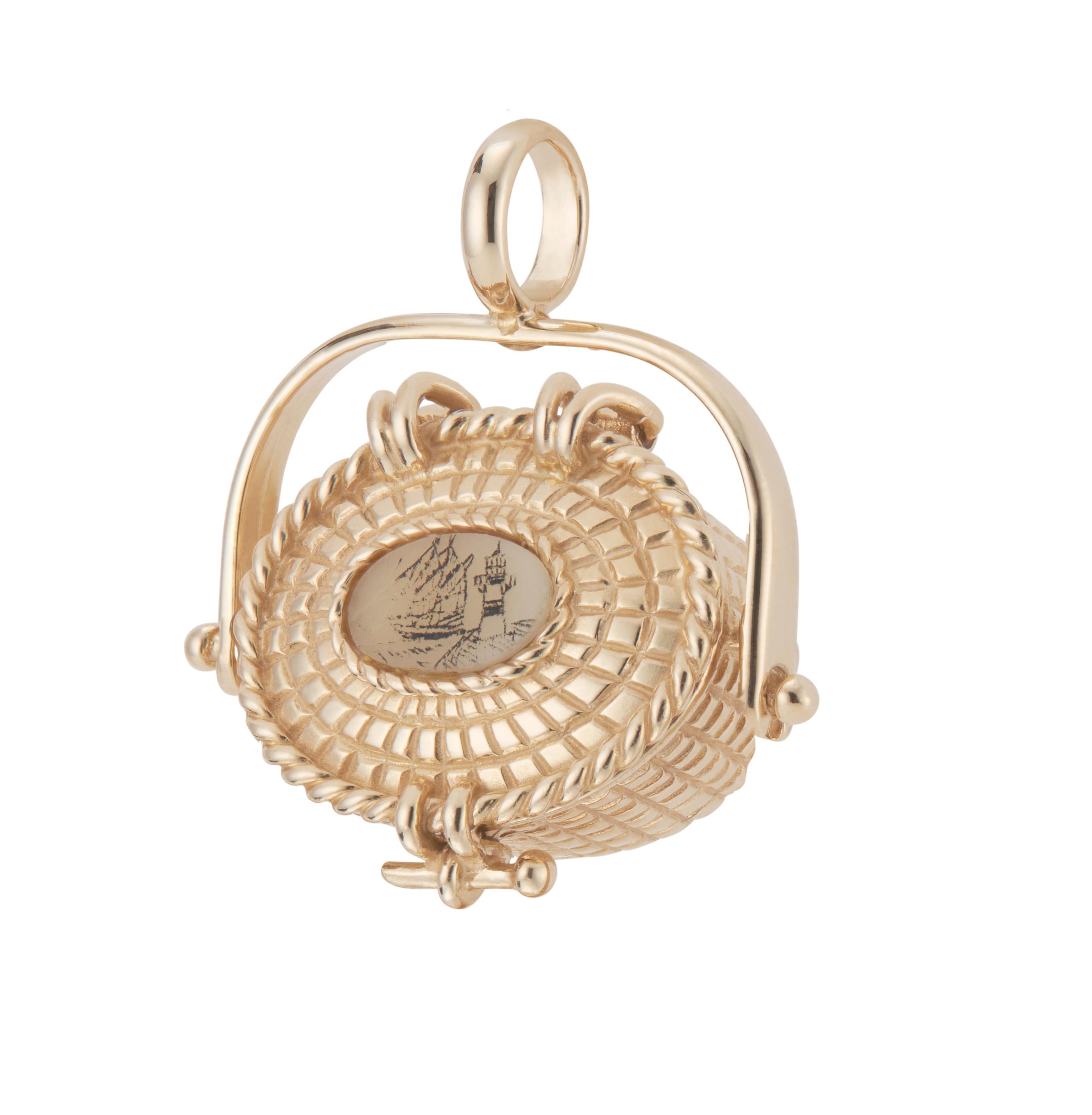 Nantucket 14k yellow gold basket pendant whaling ship and light house and coin inside.  

14k yellow gold 
Stamped: 14k 
Hallmark: Nantucket lighthouse basket 
11.7 grams
Top to bottom: 19.0mm or 3/4 Inch
Width: 21.0mm or 7/8 Inch
Depth or