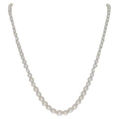 Collier en or jaune avec perles Nature et Akoya et diamants GIA 18 1/2
