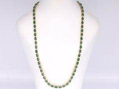 Yellow Gold Necklace with Diamonds and Emerald
