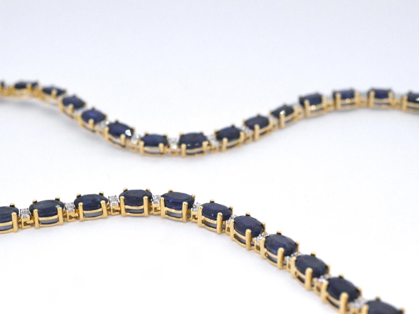 Contemporary Yellow Gold Necklace with Diamonds and Sapphire For Sale