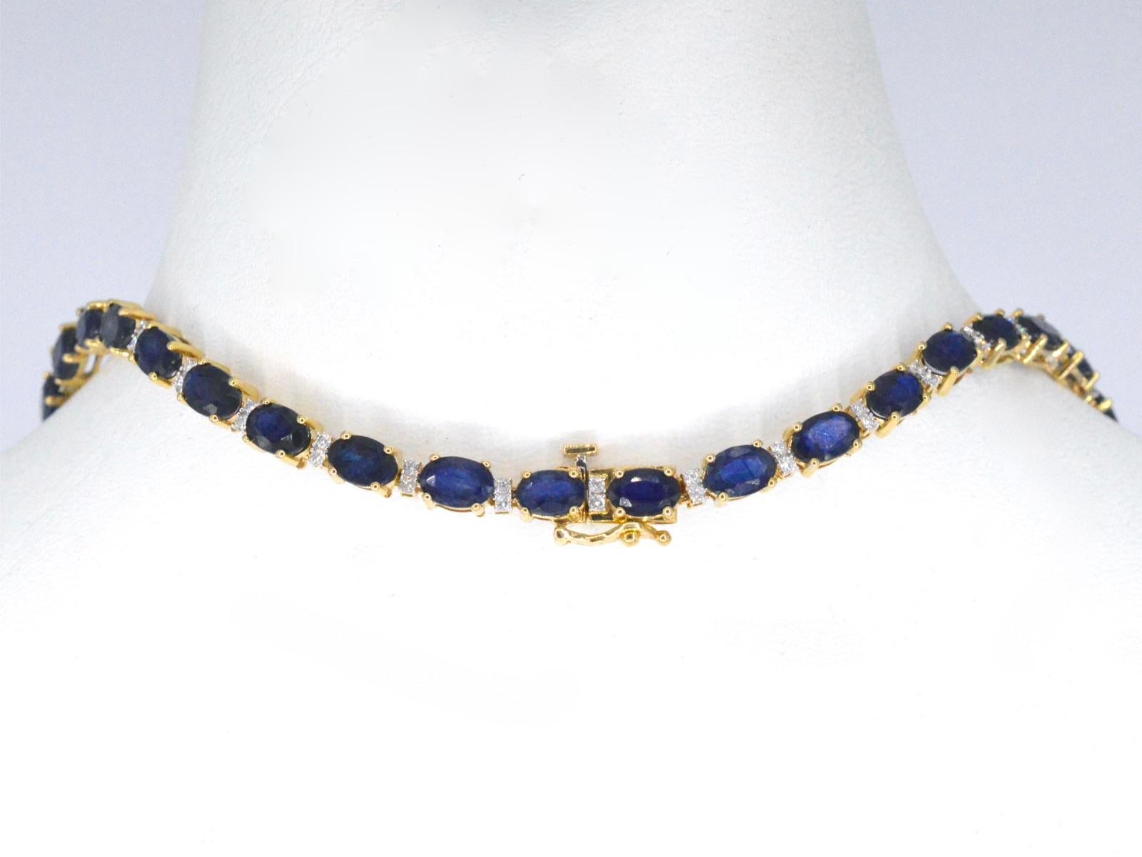 Baguette Cut Yellow Gold Necklace with Diamonds and Sapphire For Sale