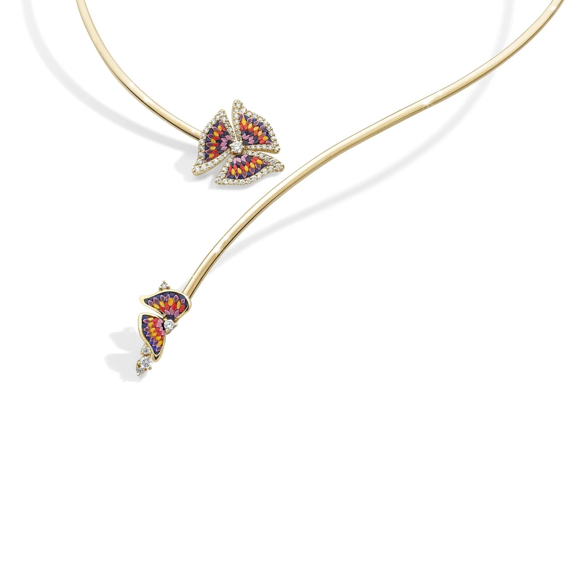 The Trinity Sunset necklace is an icon of timeless elegance that captures the elusive essence of sunset. 
A strand of yellow gold gracefully encircles the neck, culminating in a burst of micromosaic, a painting in shades of blue, orange and yellow