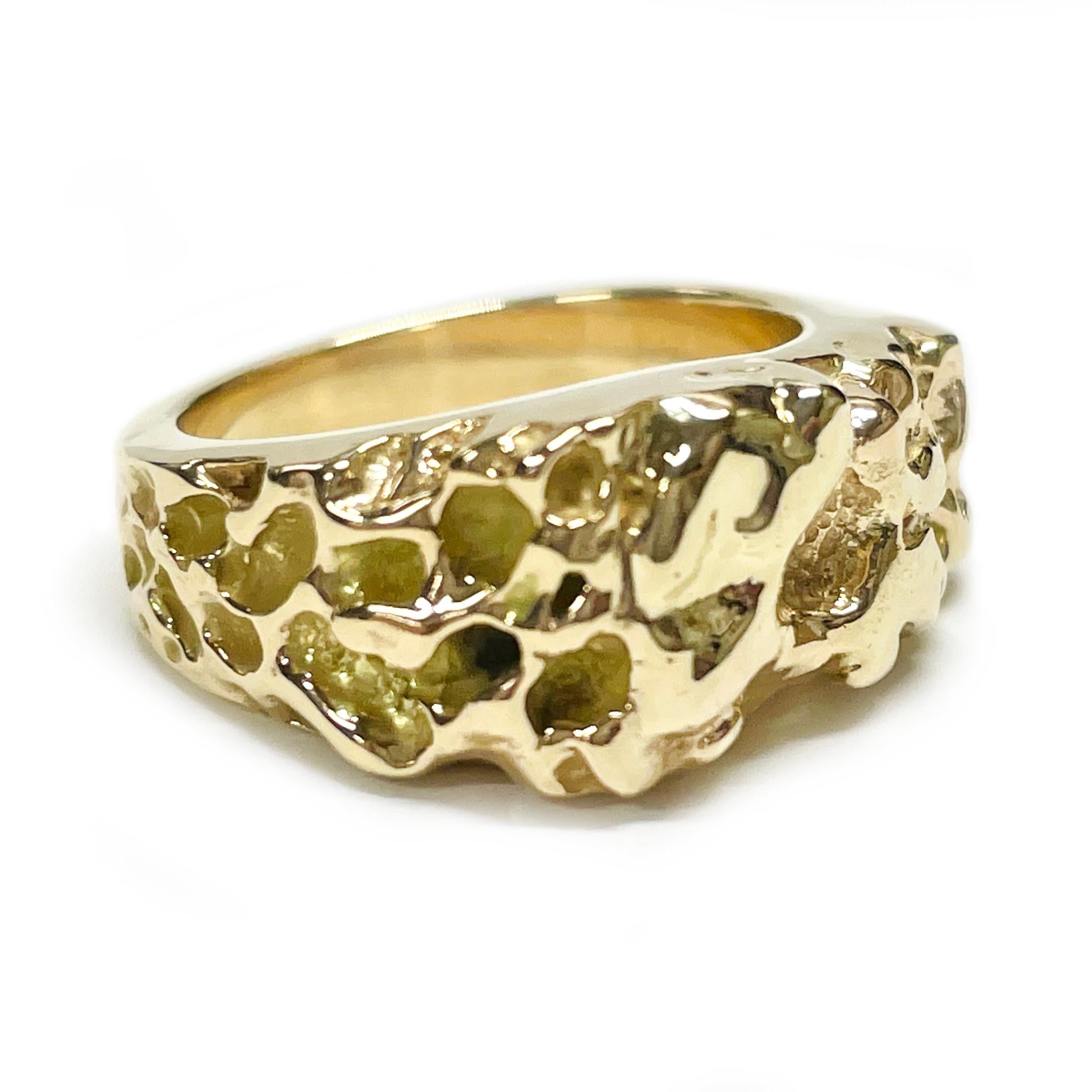 14 Karat Yellow Gold Nugget Ring. The ring features a retro look with nugget texture around a third of the ring, the rest of the ring has a smooth shiny finish. The ring size is 6 3/4. The total weight of the ring is 15.3 grams.