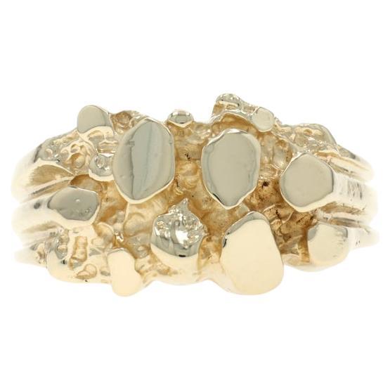 Bague fantaisie en or jaune texturée 14 carats