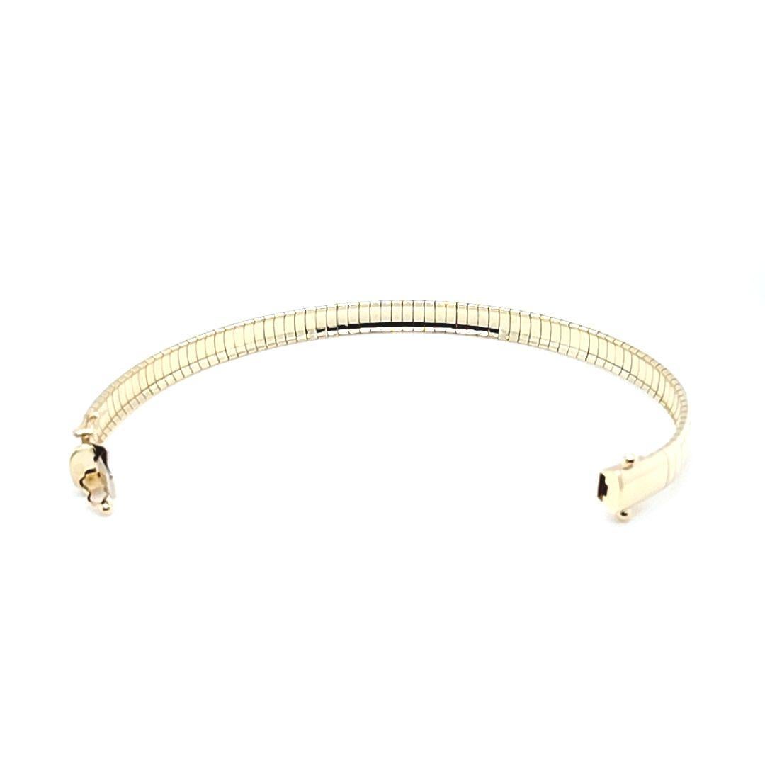 Bracelet chaîne Omega en or jaune en vente 1