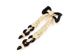 Yellow Gold Onyx and Diamond Bow Brooch