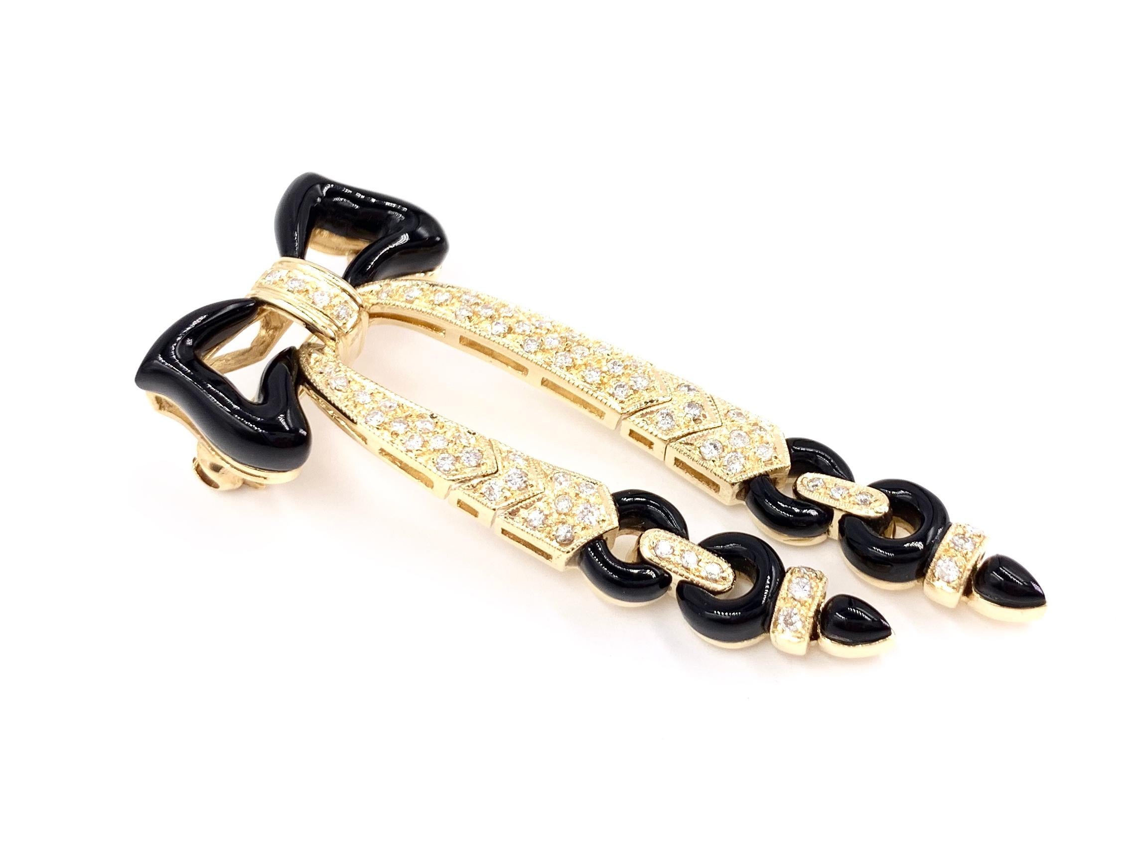 Art Deco Yellow Gold Onyx and Diamond Bow Brooch For Sale