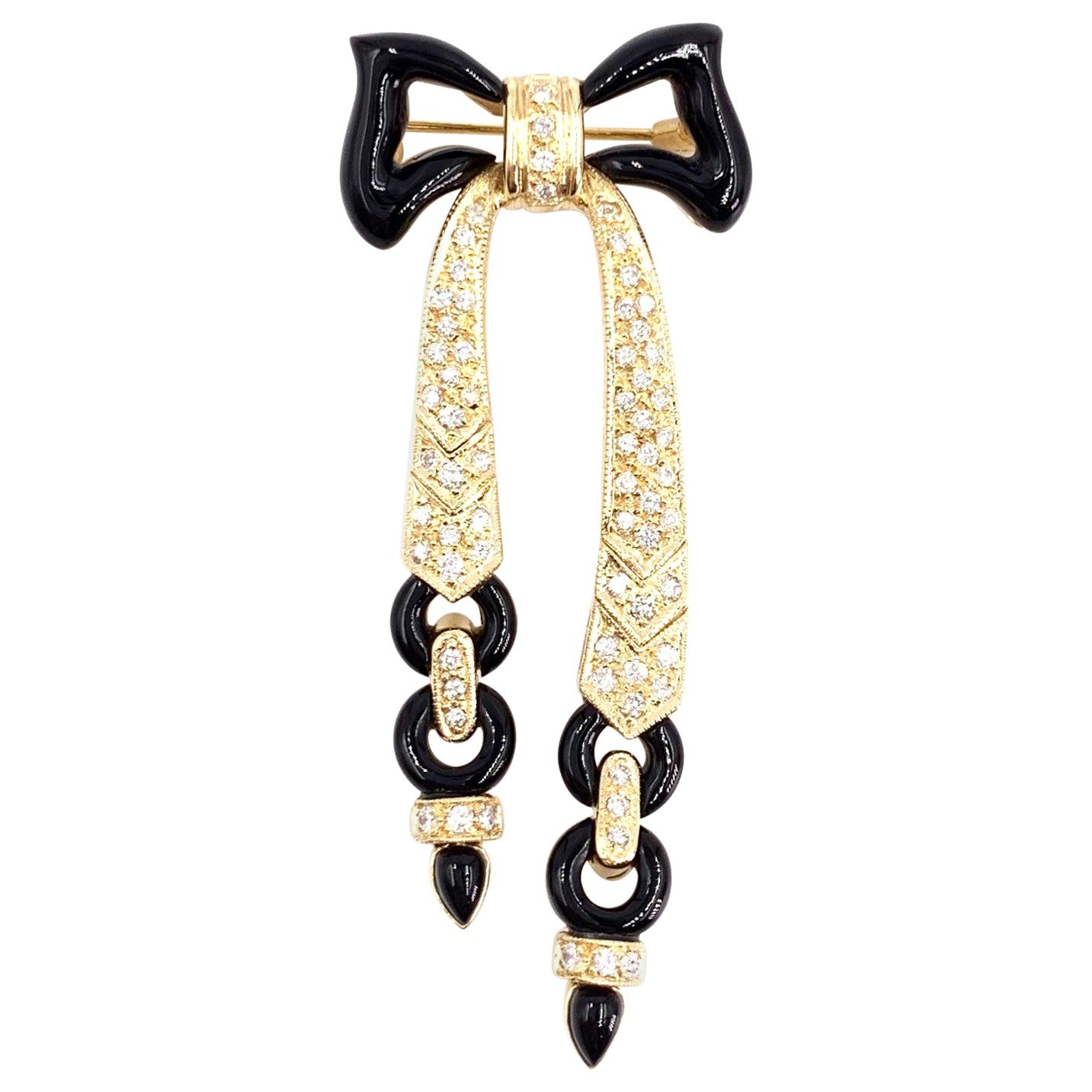 Yellow Gold Onyx and Diamond Bow Brooch For Sale