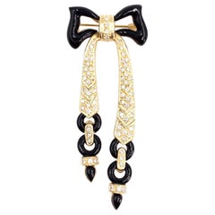 Yellow Gold Onyx and Diamond Bow Brooch