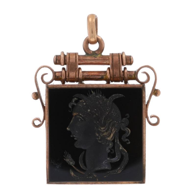 Era: Victorian
Date: 1870s - 1880s

Metal Content: 9k Yellow Gold

Stone Information
Natural Onyx
Cut: Carved Intaglio
Color: Black
Size: 19.6mm x 19.7mm

Natural Banded Agate
Color: Black & White
Size: 19.1mm x 19.5mm

Style: Fob
Theme: Ancient