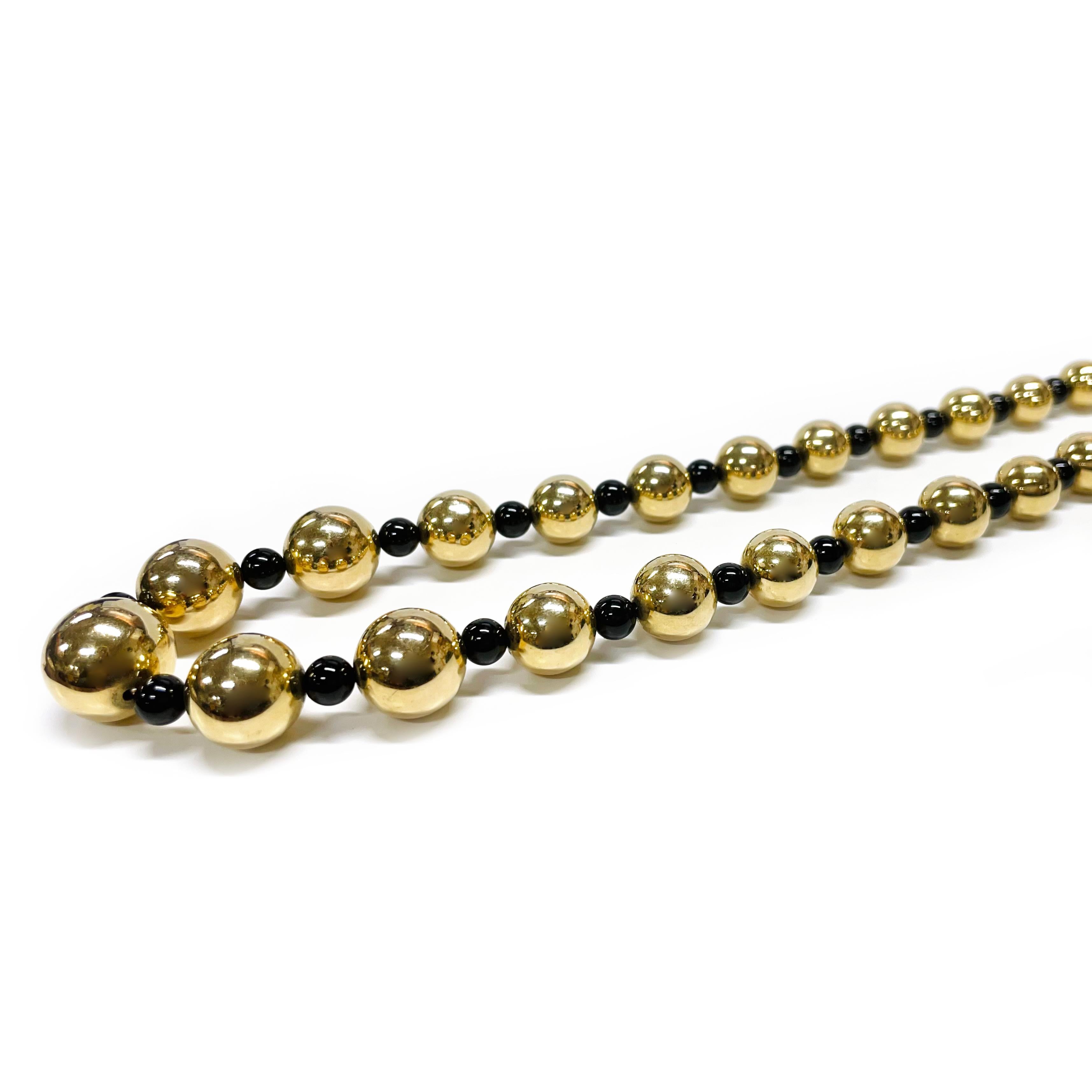 Perle Collier de perles en or jaune et onyx en vente