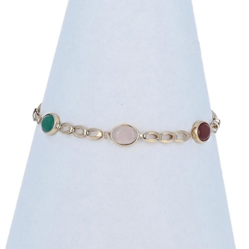 Metal Content: 14k Yellow Gold

Stone Information

Natural Onyx
Cut: Scarab

Natural Carnelian
Cut: Scarab

Natural Quartz
Cut: Scarab

Natural Green Chalcedony
Cut: Scarab

Natural Tiger's Eye
Cut: Scarab

Chain Style: Fancy
Bracelet Style: Chain
