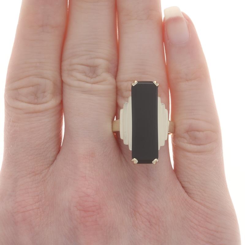Size: 8 1/4
Sizing Fee: Up 3 sizes for $35 or Down 2 sizes for $35

Metal Content: 10k Yellow Gold

Stone Information

Natural Onyx
Color: Black

Style: Cocktail Solitaire
Features: Tiered Shoulder Detailing

Measurements

Face Height (north to