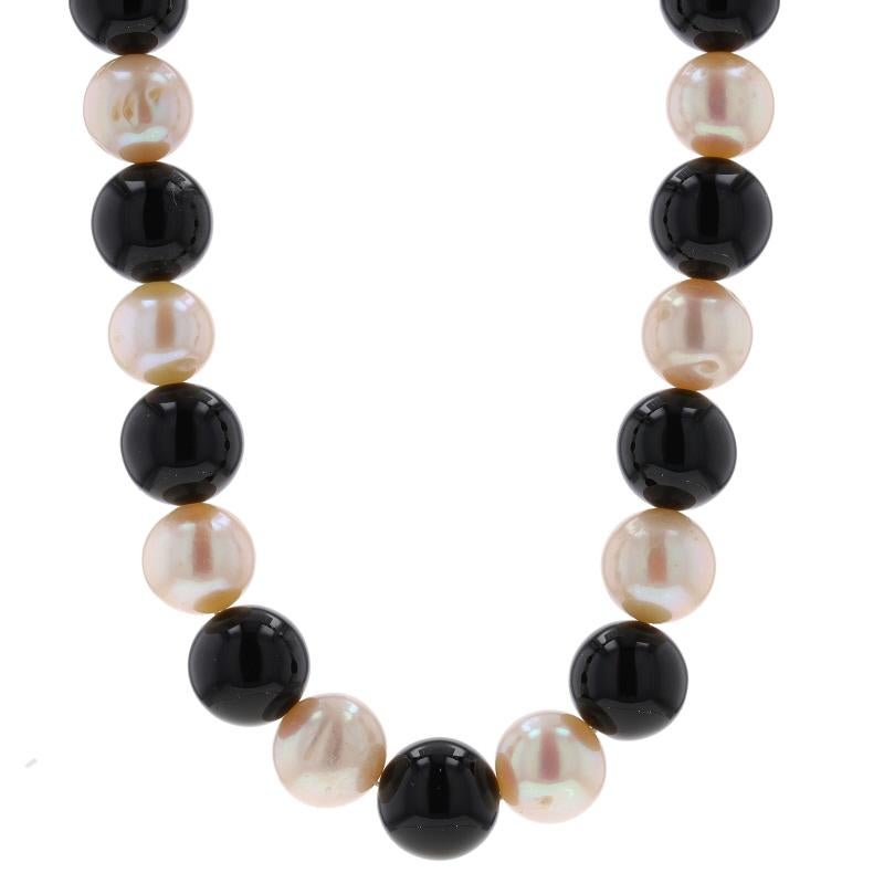 Metal Content: 14k Yellow Gold

Stone Information
Natural Onyx
Color: Black
Size: 10mm - 10.4mm

Cultured Pearls
Color: Cream
Size: 8.9mm - 9.7mm

Style: Beaded Strand
Fastening Type: Fishhook Closure

Measurements
Length: 18