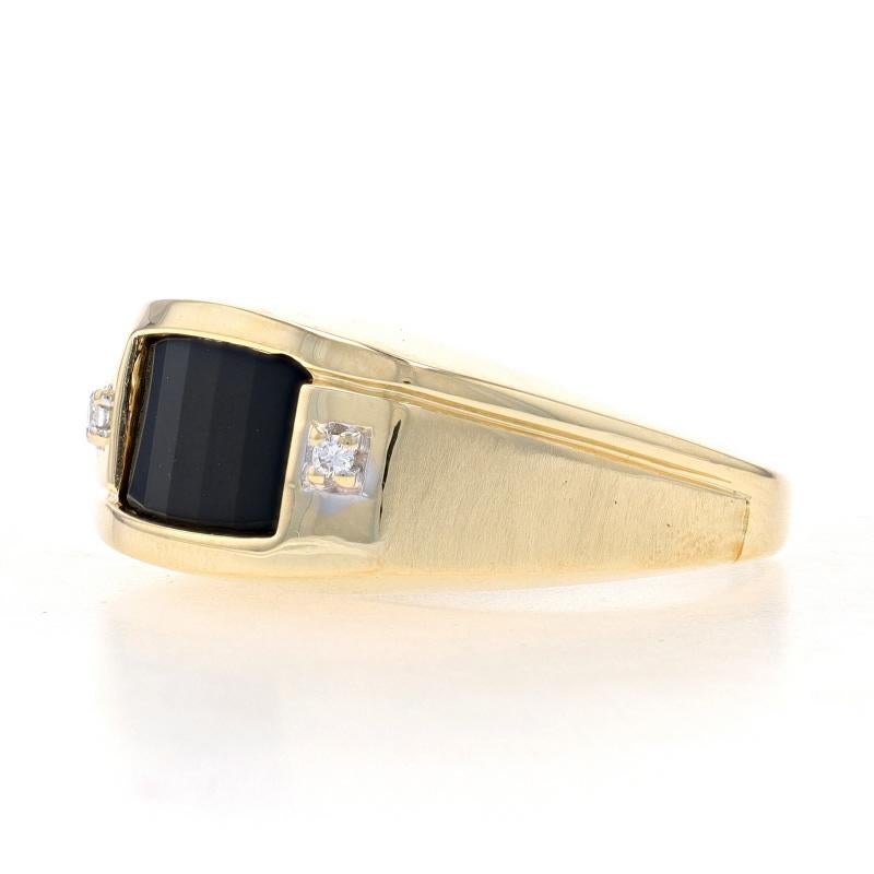 Size: 10 1/4
Sizing Fee: Up 1/2 a size for $30 or Down 1/2 a size for $30

Metal Content: 14k Yellow Gold & 14k White Gold

Stone Information
Natural Onyx
Cut: Barrel
Color: Black

Natural Diamonds
Cut: Single
Stone Note: (two small accents)

Style: