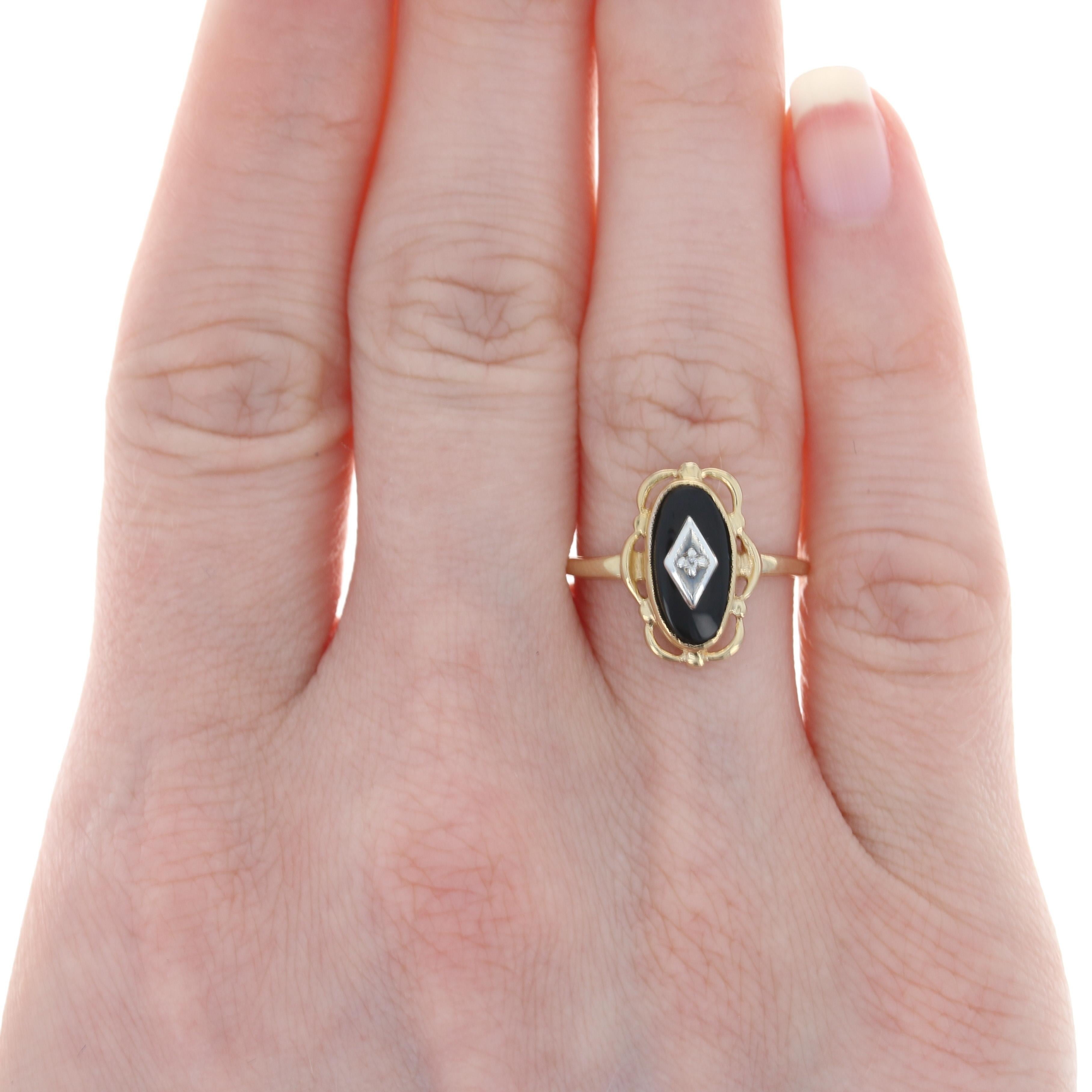 Size: 6 1/2
Sizing Fee: Down 2 sizes for $20 or up 2 sizes for $25

Metal Content: 10k Yellow Gold & 10k White Gold 

Stone Information: 

Genuine Onyx
Color: Black

Natural Diamonds
Carat(s): (One small accent)
Cut: Single

Style: Solitaire with