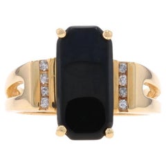 Ring aus Gelbgold mit Onyx und Diamant - 14k