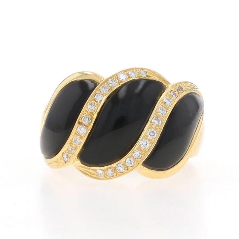 Size: 6 3/4

Metal Content: 18k Yellow Gold

Stone Information

Natural Onyx
Color: Black

Natural Diamonds
Carat(s): .20ctw
Cut: Round Brilliant
Color: F - G
Clarity: VS1 - VS2

Total Carats: .20ctw

Style: Three-Stone with