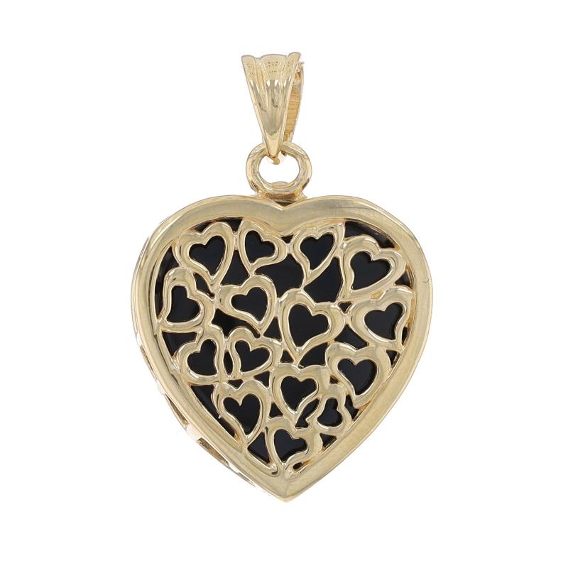Metal Content: 14k Yellow Gold

Stone Information
Natural Onyx
Cut: Heart
Color: Black

Theme: Heart, Love
Features: Reversible Open Cut Design

Measurements
Tall (from stationary bail): 13/16