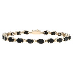 Yellow Gold Onyx Tennis Bracelet 7" - 10k Oval