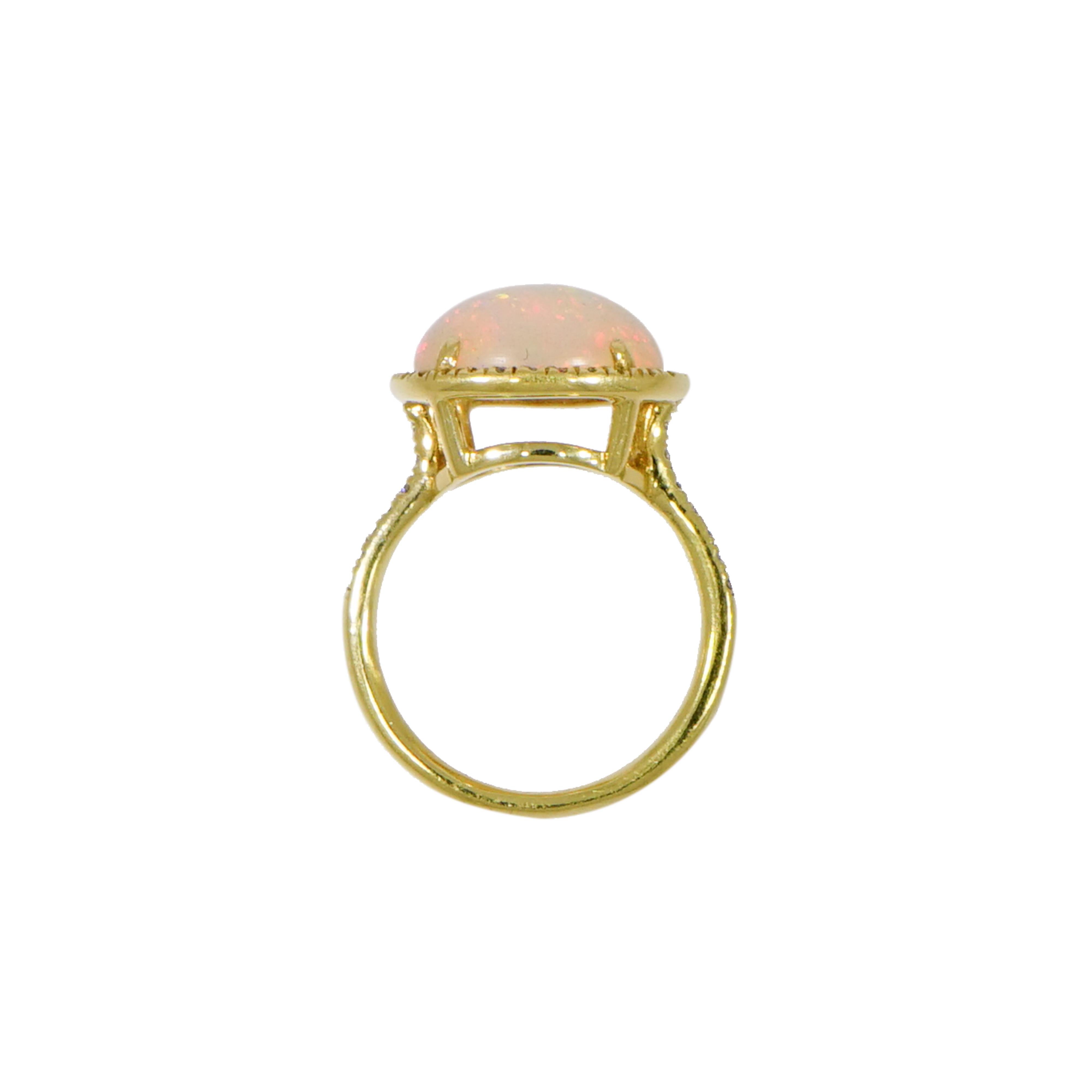 This Oval shaped Opal and Diamond Ring is great for both the minimalist and the maximalist. 
It's easy to wear on it's own and should be at the top of mind for the ones who appreciate a trend but is also a style they can wear for life.
Designed and
