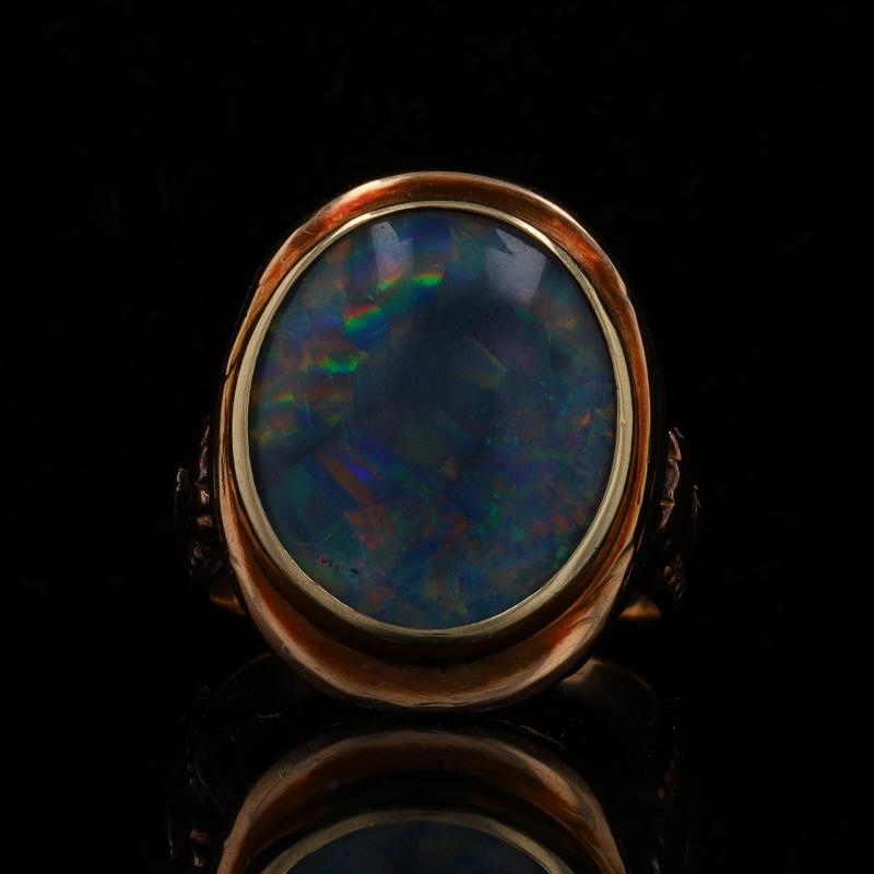 Size: 3
Sizing Fee: Up 3 sizes for $60 or Down 1 size for $30

Note: The resizing process will require the shank to be replaced.

Era: Antique

Metal Content: 14k Yellow Gold

Stone Information
Natural Opal
Cut: Triplet

Style: Cocktail