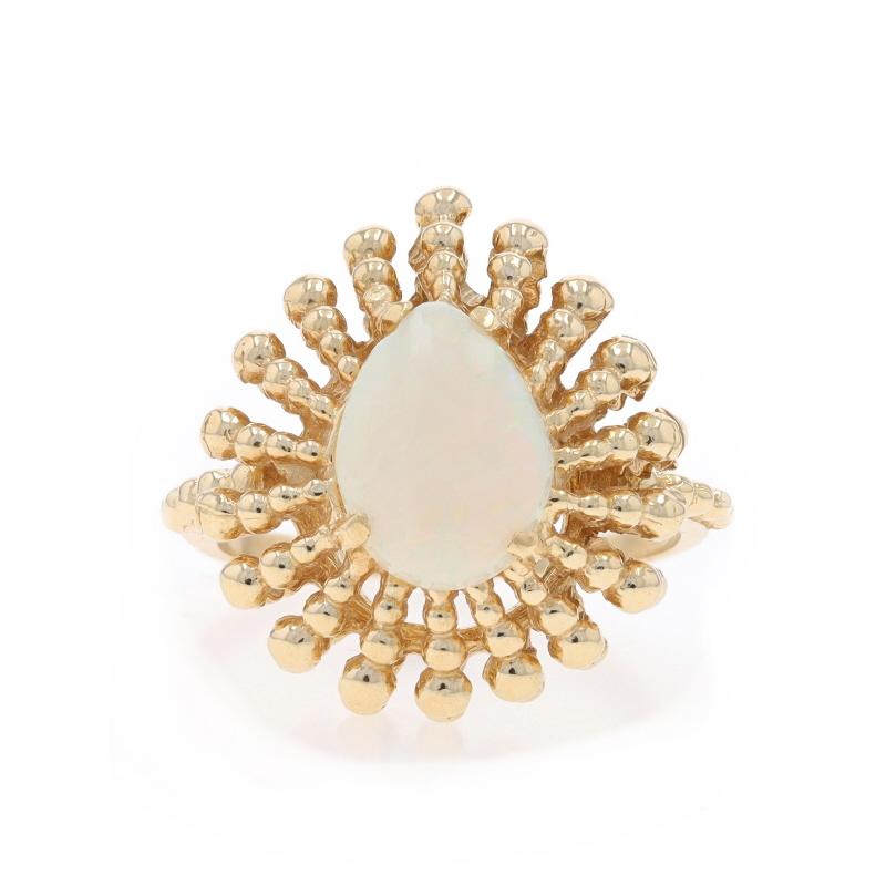Size: 10 3/4
Sizing Fee: Up 3 sizes for $35 or Down 2 sizes for $25

Metal Content: 14k Yellow Gold

Stone Information

Natural Opal
Carat(s): 1.75ct
Cut: Oval Cabochon
Origin: Australian

Total Carats: 1.75ct

Style: Cocktail