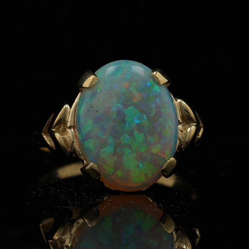 Size: 7 1/4
Sizing Fee: Up 2 sizes for $35 or Down 2 sizes for $30

Metal Content: 14k Yellow Gold

Stone Information

Natural Opal
Carat(s): 3.73ct
Cut: Oval Cabochon
Stone Note: Australian

Total Carats: 3.73ct

Style: Cocktail Solitaire
Features: