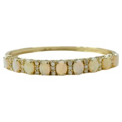 Bracelet en or jaune avec opale et diamant