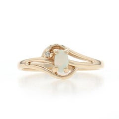 Yellow Gold Opal Diamond Bypass Ring - 10k Oval Cabochon .13ctw