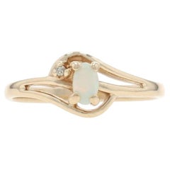 Yellow Gold Opal Diamond Bypass Ring - 10k Oval Cabochon .13ctw