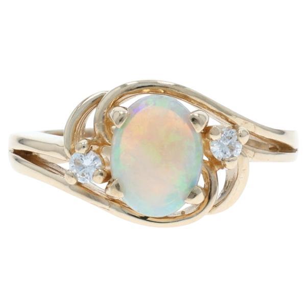 Anello bypass con diamante Opale in oro giallo 14k Cabochon ovale .80ctw