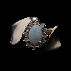 Yellow Gold Opal & Diamond Halo Bypass Ring - 10k Oval Cabochon .42ctw