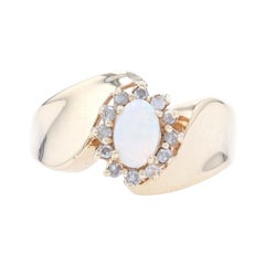 Yellow Gold Opal & Diamond Halo Bypass Ring - 10k Oval Cabochon .42ctw