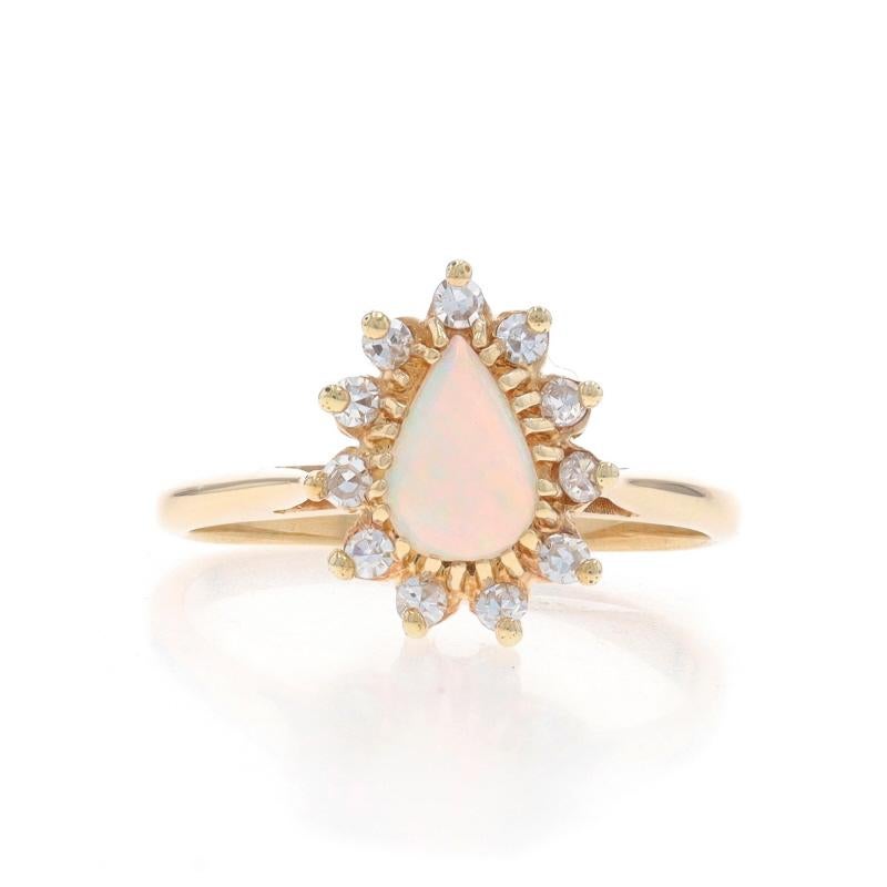 Size: 6 3/4
Sizing Fee: Up 3 sizes for $30 or Down 2 sizes for $30

Metal Content: 10k Yellow Gold

Stone Information

Natural Opal
Carat(s): .38ct
Cut: Pear Cabochon

Natural Diamonds
Carat(s): .22ctw
Cut: Single
Color: G - H
Clarity: VS1 -