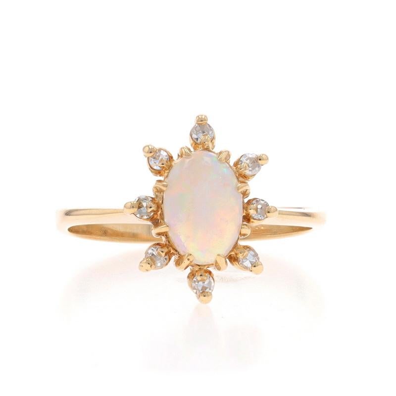 Size: 4 1/4
Sizing Fee: Up 3 sizes for $35 or Down 2 sizes for $35

Metal Content: 14k Yellow Gold

Stone Information

Natural Opal
Carat(s): .40ct
Cut: Oval Cabochon

Natural Diamonds
Carat(s): .08ctw
Cut: Single
Color: G - H
Clarity: VS1 -