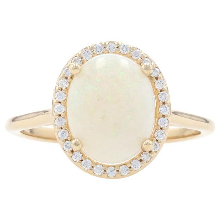 Anello aureola in oro giallo con opale e diamante, 14k taglio cabochon ovale 1,77ctw