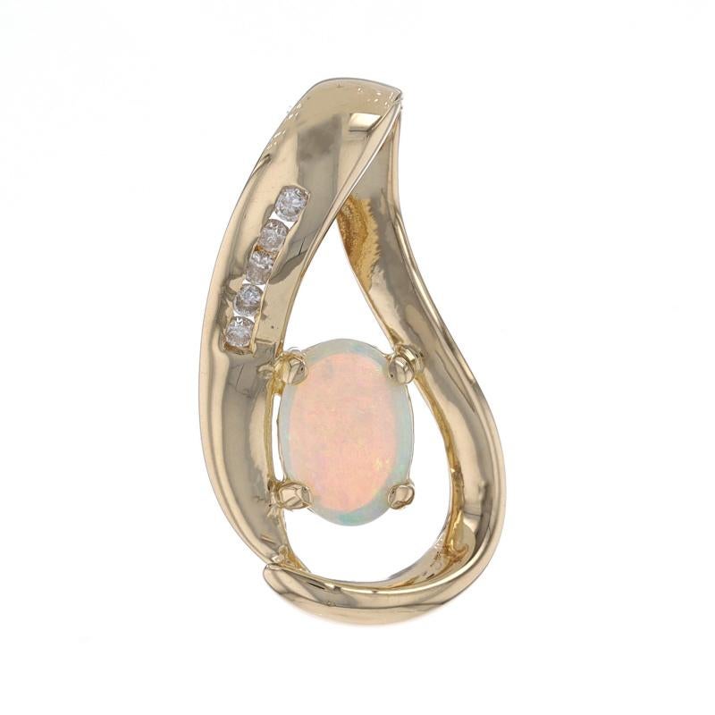 Metal Content: 14k Yellow Gold

Stone Information

Natural Opal
Carat(s): .55ct
Cut: Oval Cabochon
Stone Note: Australian

Natural Diamonds
Carat(s): .05ctw
Cut: Round Brilliant
Color: H - I
Clarity: SI2 - I1

Total Carats: .60ctw

Features: Channel