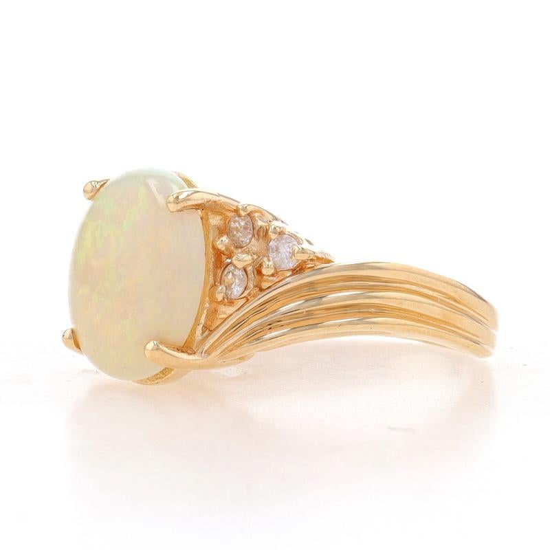 Yellow Gold Opal & Diamond Ring - 14k Oval Cabochon 2.79ctw Bypass In Excellent Condition For Sale In Greensboro, NC