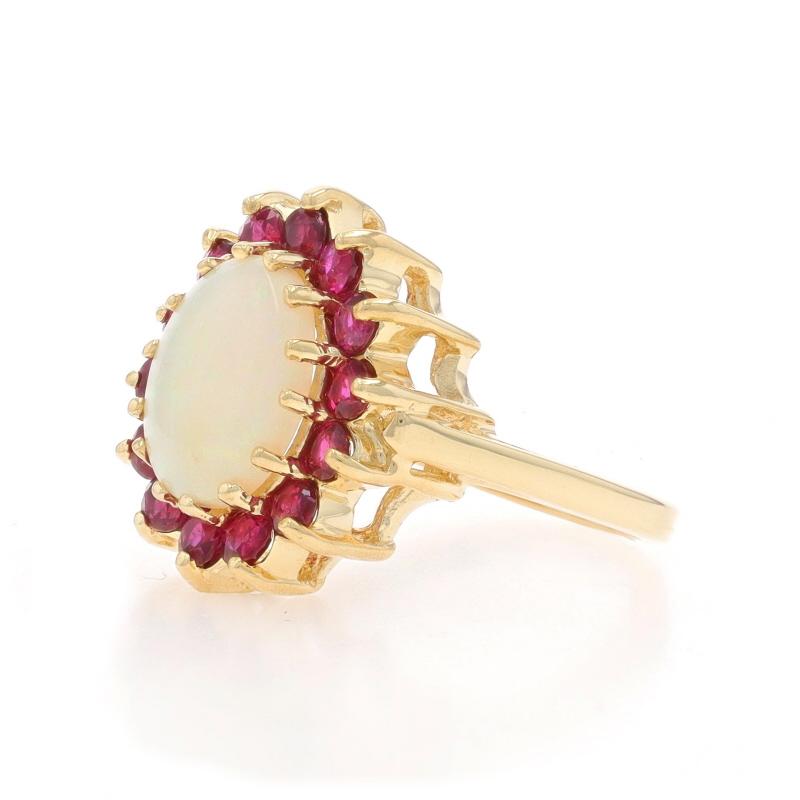 Yellow Gold Opal Ruby Halo Ring - 14k Oval Cabochon 2.28ctw In Excellent Condition For Sale In Greensboro, NC