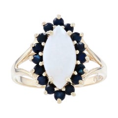 Yellow Gold Opal 
Sapphire Halo Ring, 10k Marquise Cabochon Cut 2.16ctw