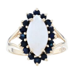 Yellow Gold Opal
Sapphire Halo Ring, 10k Marquise Cabochon Cut 2.16ctw Antique Yellow Gold Opal
Sapphire Halo Ring, 10k Marquise Cabochon Cut 2.16ctw