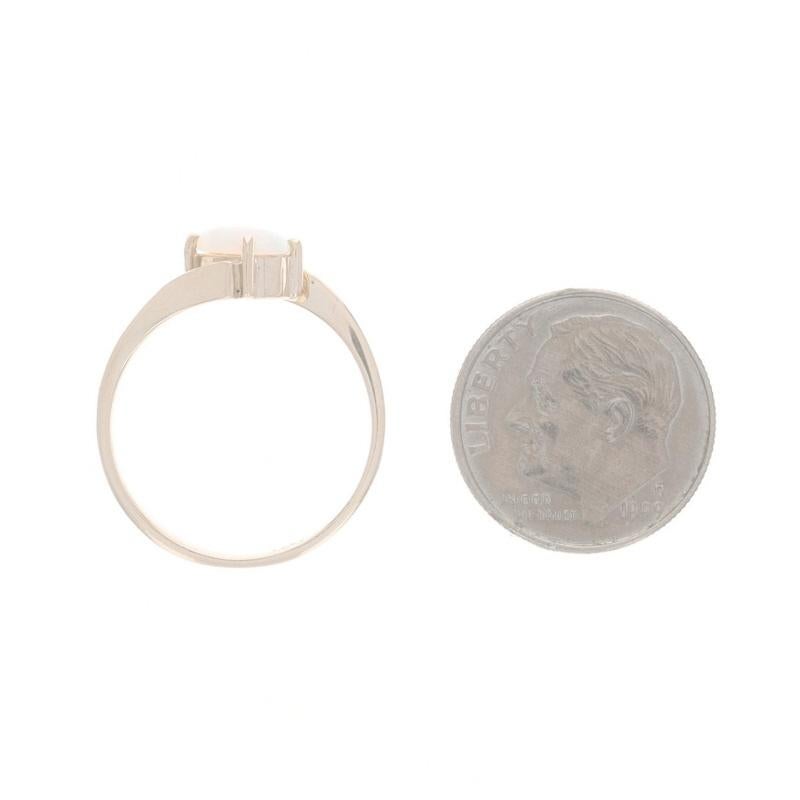 Gelbgold Opal Solitär Bypass Ring - 10k Oval Cabochon 0,35ct 1