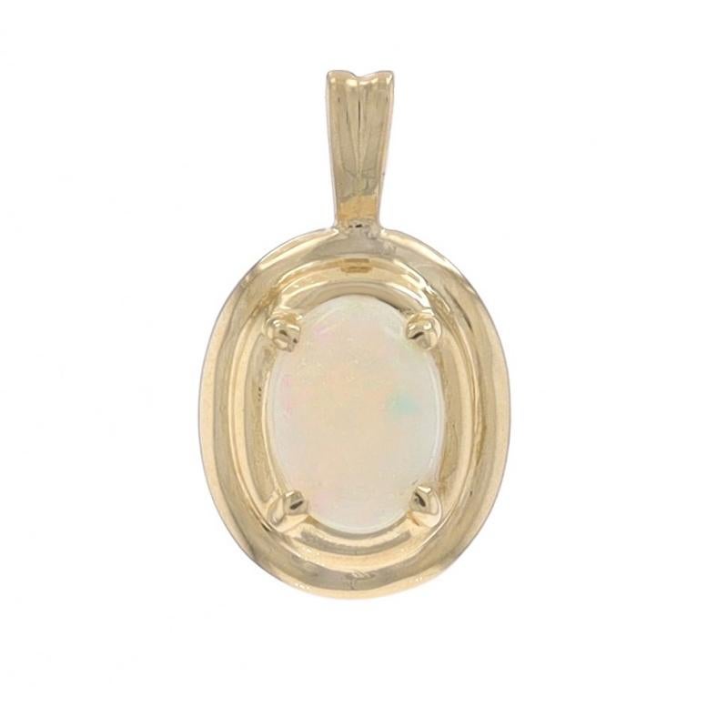 Metal Content: 14k Yellow Gold

Stone Information

Natural Opal
Carat(s): .62ct
Cut: Oval Cabochon

Total Carats: .62ct

Style: Solitaire

Measurements

Tall (from stationary bail): 23/32