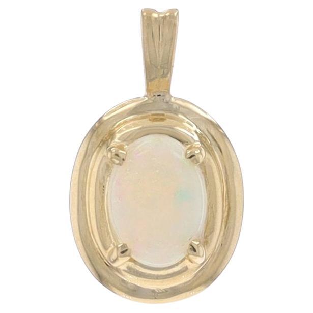 Yellow Gold Opal Solitaire Pendant - 14k Oval Cabochon .62ct For Sale