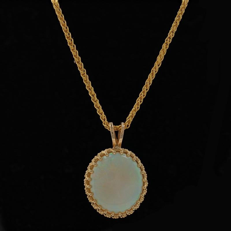 Metal Content: 14k Yellow Gold

Stone Information

Natural Opal
Carat(s): 6.20ct
Cut: Oval Cabochon
Stone Note: Australian

Total Carats: 6.20ct

Style: Solitaire
Chain Style: Wheat
Necklace Style: Chain
Fastening Type: Lobster Claw