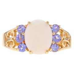 Anillo de Oro Amarillo Ópalo y Tanzanita - Cabujón Oval de 10k 1,45ctw